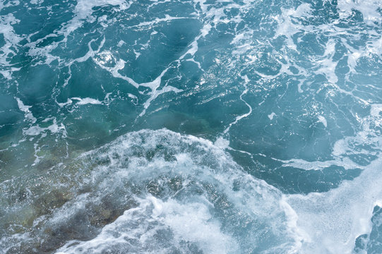 sea water surface with a spindrift