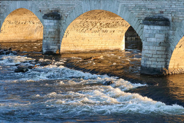 Coucher de soleil sous le pont