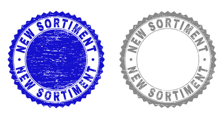Grunge NEW SORTIMENT stamp seals isolated on a white background. Rosette seals with grunge texture in blue and grey colors. Vector rubber stamp imitation of NEW SORTIMENT label inside round rosette.