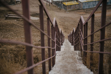 Iron ladder for descent from the bridge