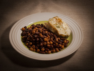 Plate with a diet food. Beans, chickpeas and zander