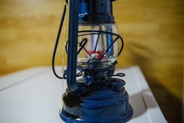 Blue new kerosene lamp in the room