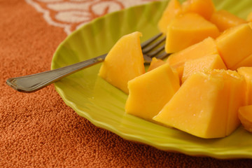 Papaya slices on a plate