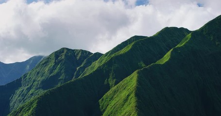 Aerial shot of beautiful green ridges and mountains
