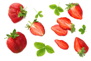 Strawberry with green leaf and slices isolated on white background. Healthy food. top view