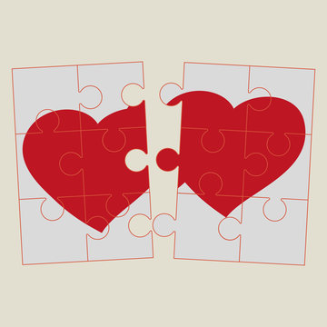 Two hearts puzzle. broken puzzle. Couple of red hearts.