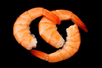 shrimps isolated on a black background. top view