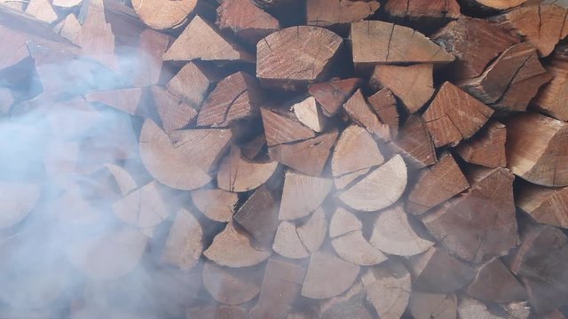 Campfire woodpile and smoke