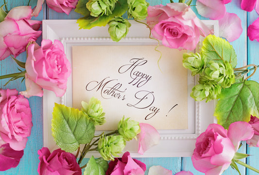 happy mothers day. composition with photo frame
