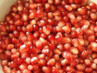 Burgundy pomegranate seeds close-up