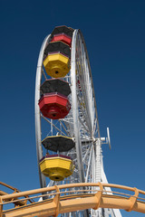 Southern California ferris wheel and deep blue sky.