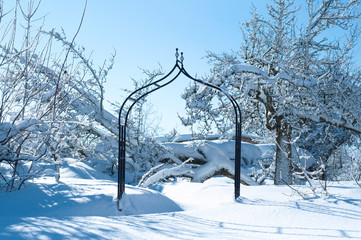 Wedding Arches covered with snow in the countryside