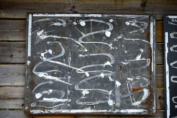 remains of the glue used to paste some informative posters on a panel of the green ring of the city of Vitoria-Gasteiz (Alava) Basque Country, Spain