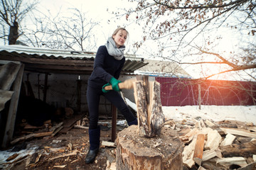 Girl chopping wood