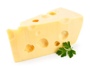 Piece of cheese with a sprig of parsley closeup on a white. Isolated.