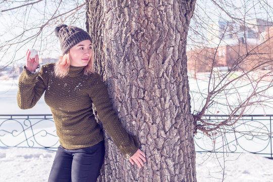 Hide Behind A Tree Playing Snowballs