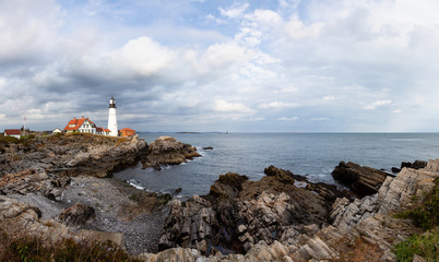 Beautiful panoramic view of Portland Head Lighthouse on the Atlantic Ocean Coast. Taken in Fort Williams Park, Portland, Maine, United States.