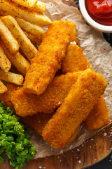Fish fingers, mashed peas and chips fries. Traditional British fast food