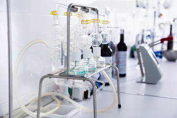 modern laboratory of winery. Checking acidity of wine and organoleptic characteristics