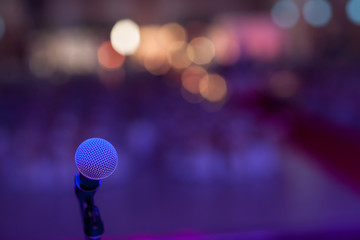 microphone in concert hall or conference room soft and blur style for background.Microphone over...