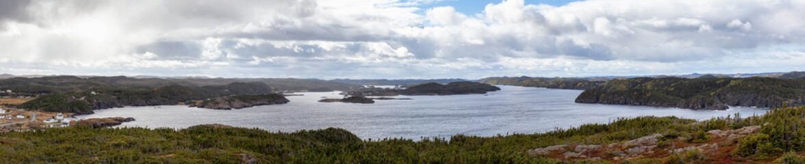 Panoramic View of a Canadian Landscape on the Atlantic Ocean Coast during a cloudy morning. Taken in Pikes Arm, Newfoundland and Labrador, Canada.