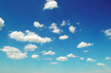 Light clouds in the blue sky.