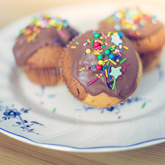 Homemade sweet tasty muffins with colourful decoration