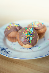 Homemade sweet tasty muffins with colourful decoration