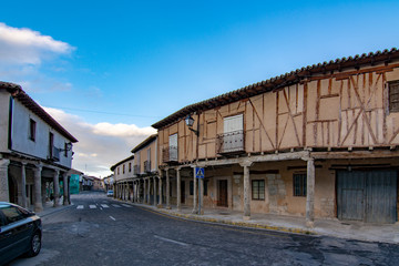 Fototapeta na wymiar Street with arcades in Ampudia, Palencia