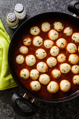 cheese veggie ricotta meatballs in tomato sauce in a pan. traditional Italian cuisine for the whole family, party or restaurant menu