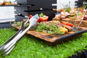 grilled steak with strawberries and rosemary