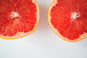Fresh half grapefruit isolated on white background.