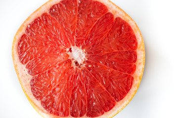 Fresh half grapefruit isolated on white background.
