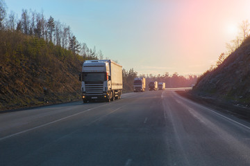 truck column moves along the mountain road