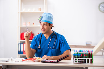 Mad doctor working in the clinic