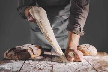 Selbstklebende Fototapeten Chef making fresh dough for baking © nerudol