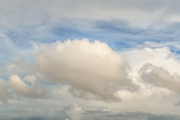 Cumulus fluffy white clouds texture against blue sky background , heaven