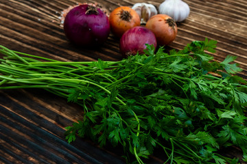 parsley on wooden table