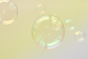Photo of soap bubbles, creative background, selective focus, toned image