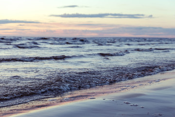 Seashore and waves at sunset. Calmness, awareness, the path to yourself. Harmony and life without stress