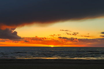 Seashore and waves at sunset. Calmness, awareness, the path to yourself. Harmony and life without stress