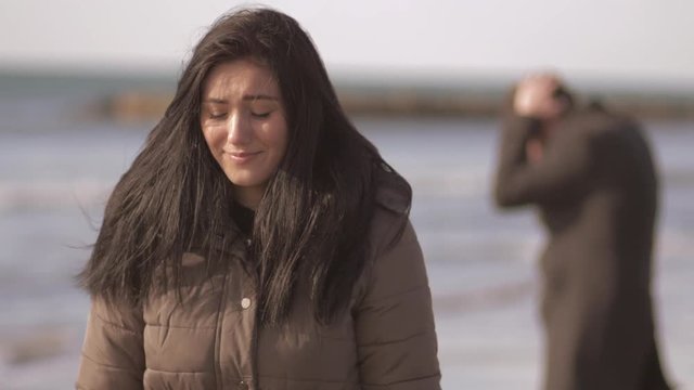 Woman looking for the last time boyfriend after breakup crying  at sunset