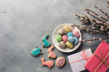 Easter gingerbread cookies on wooden table. Rabbits and eggs. Greeting card. Top view with space for your greetings.