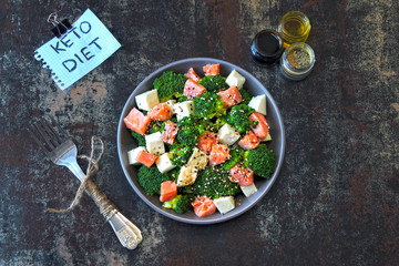 Healthy Salad with Salmon, Broccoli and White Cheese. Keto diet. Poke bowl