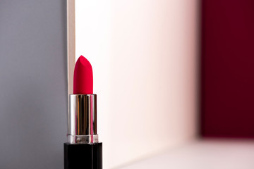 Pink lipstick on modern background