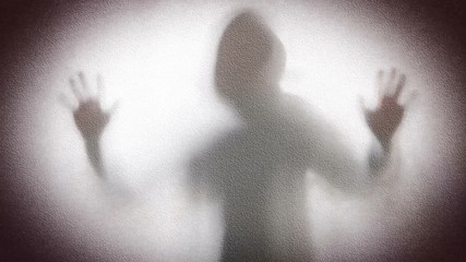 silhouette of a man in light