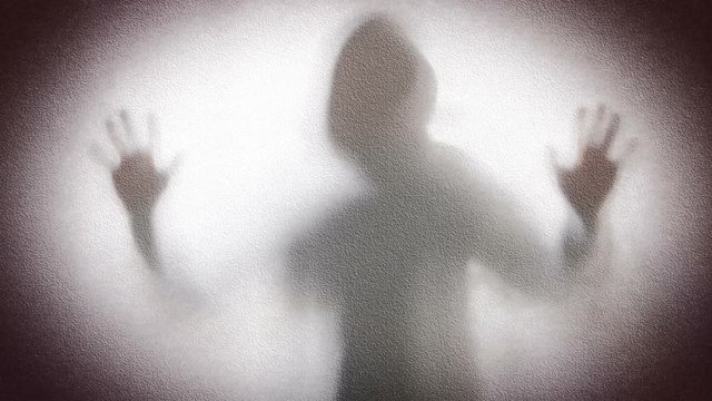 silhouette of a man in light