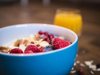 Delicious and healthy breakfast bowl with fruits and nuts