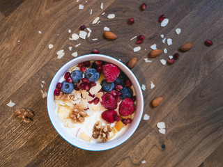 Delicious and healthy breakfast bowl with fruits and nuts
