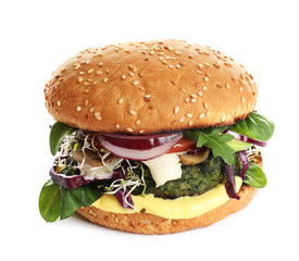 Tasty vegetarian burger with spinach cutlet on white background